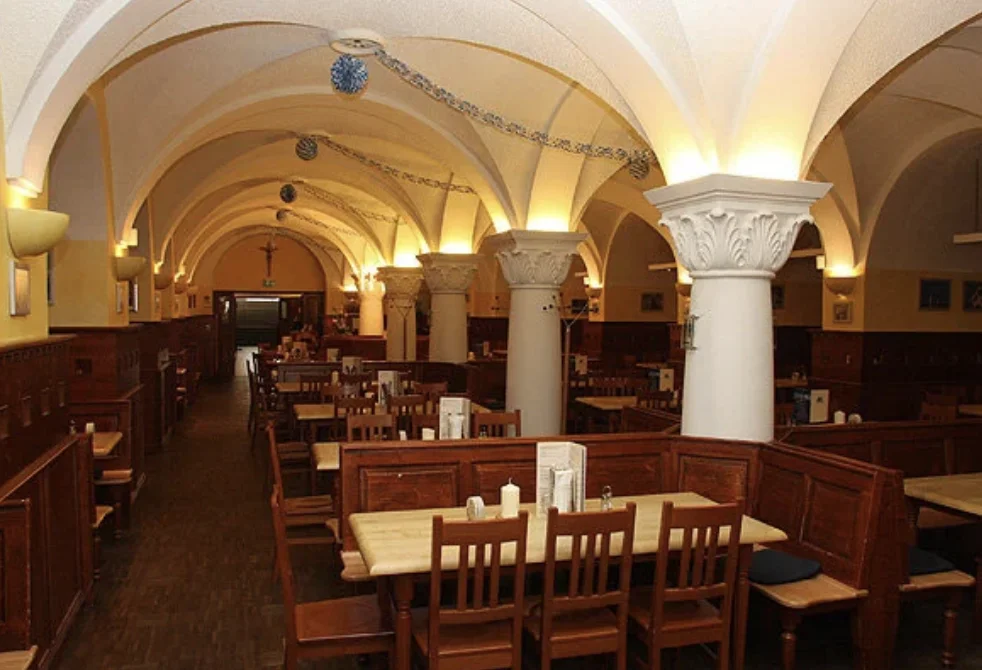 authentic dining under the arches of the old rathaus